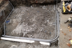 Running conduit and setting the drain line